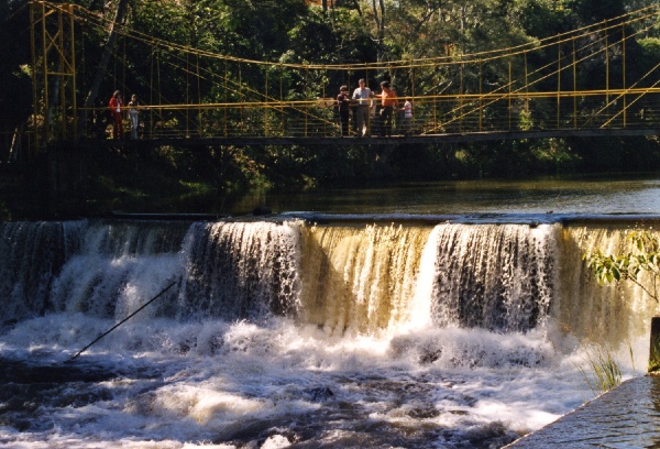 bridge hanging over the waterfall