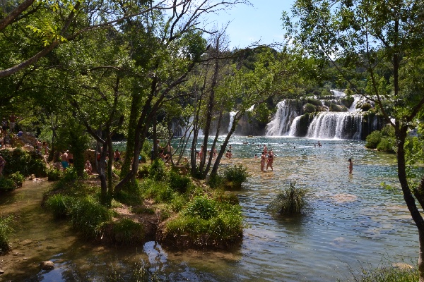 swimming below the falls