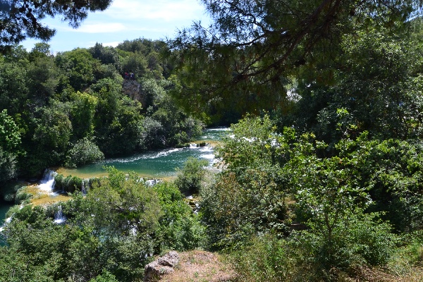 and the deep blue-green water