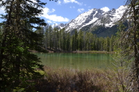 postcard view of lake and mountain