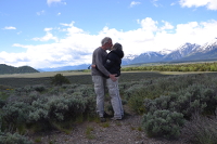 kissing couple along the road